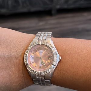 Guess soft pink watch. Missing 1 stone.
